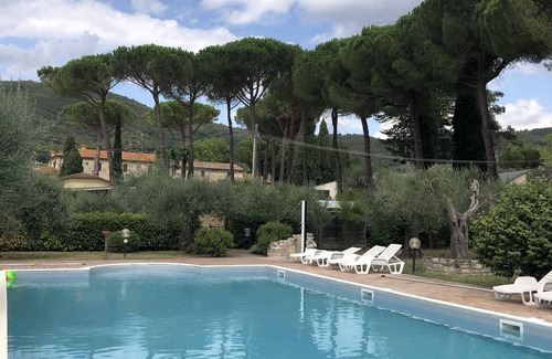 Passignano sul Trasimeno Apartment | Delightful apartment with pool, ideal for families. We accommodate dogs.