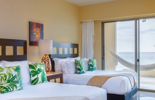 Mismaloya Resort | Deluxe RoomnUnparalleled ocean views from suite’s private terraces