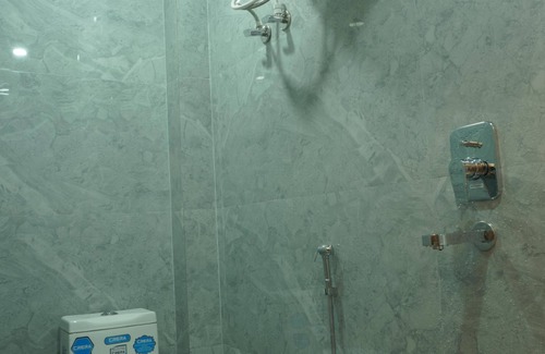 Chandauli Bed & Breakfast | Deluxe Twin Double Bedroom with Private Ganga View Balcony.