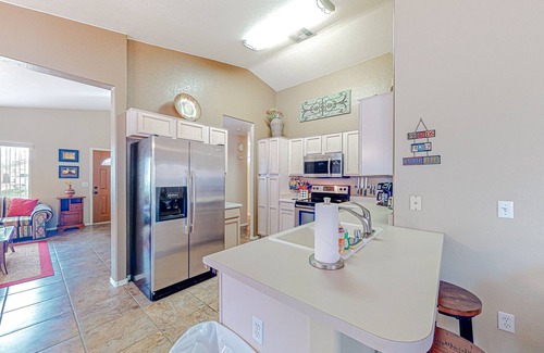 Apache Junction House | Desert charmer with enclosed yard, heated pool, smart TVs, W/D, & full kitchen