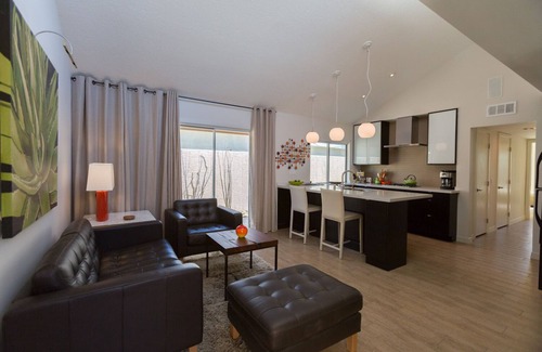 Uptown Design District Condo | Designer Condo With Wrap Around Patio Located in the Famous Movie Colony