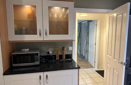 Willian House | Detached family house with private garden.