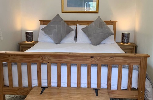Liskeard House | Detached One Bedroom Cottage overlooking field and stream
