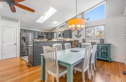 Rehoboth by the Sea House | Dewey Beach home with enclosed lanai, hot tub, patio & firepit - 1 dog welcome