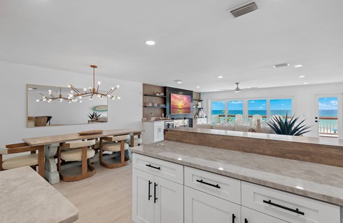 Fort Walton Beach - Destin House | Direct beachfront luxury in Destin! Enjoy sweeping Gulf views from 3 patios, private beach access with chairs & umbrellas, a movie room, pinball, and a designer kitchen with Viking & Wolf appliances. Sleeps 14 in style and comfort.