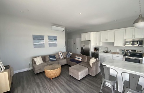 Hull House | Direct Ocean Front Condo with large wrap around balcony