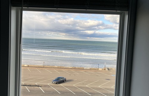 Hull House | Direct Ocean Front Condo with large wrap around balcony