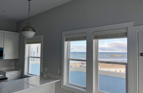 Hull House | Direct Ocean Front Condo with large wrap around balcony