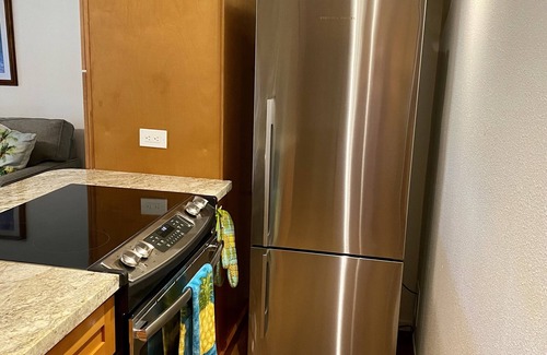 Kihei Condo | Discounted! Partial ocean view condo with pool & just steps to beach.