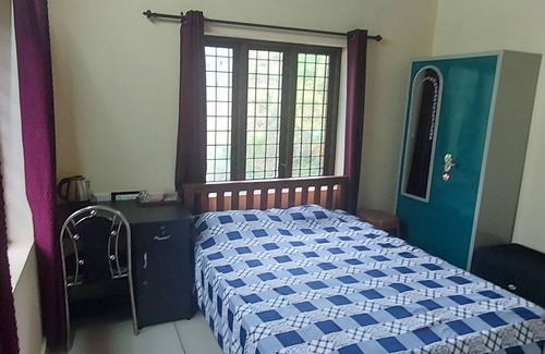 Mannarkkad House | Discover a peaceful retreat nestled in the breathtaking mountains of Attapady,