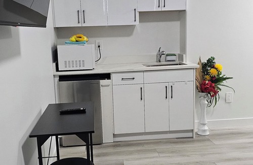 Saskatoon Apartment | "Discover Dominion's Crib! This chic and cozy space is ideal for travelers.