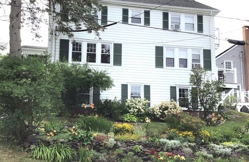 Loveitts Field House | Distinguished classic coastal home overlooks Casco Bay and Maine’s rocky shore!
