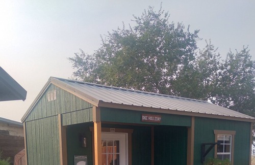 Imlay Cabin | Doc Holliday, has a double bed, sleeps 2 and has a detached private bathroom.