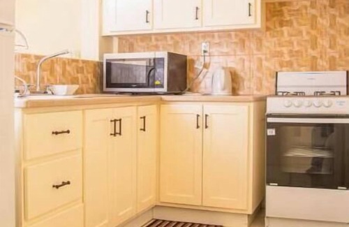 Buckleys Village Apartment | Doc's Paradise Red Apartment