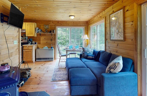 Stockton Springs Cottage | Dog-friendly home in the trees with ocean view & patio - near Fort Point