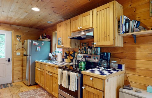 Stockton Springs Cottage | Dog-friendly home in the trees with ocean view & patio - near Fort Point