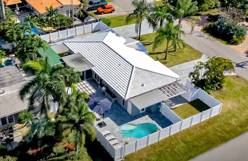 Coral Heights House | Dog-friendly house with patio, private outdoor pool, enclosed yard, & grill