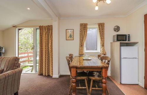Keswick Cottage | DOGWOOD TIMBER LODGE, pet friendly, with a garden in Keswick