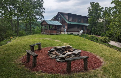 Marshall Cabin | Doolittle mountain cabin with hot tub, firepit & river views | near Asheville