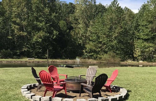 Nelsonville House | Dorr Run Retreat A cozy home nestled in the woods with a pond. ATV friendly!