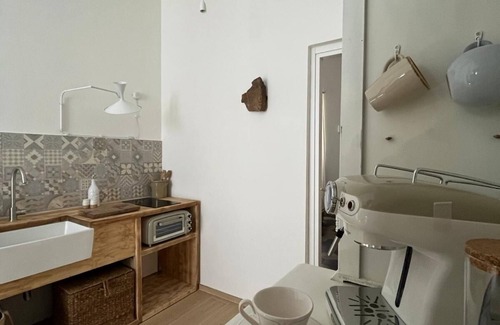 Viterbo Apartment | Downtown apartment with in-room bath and wide vaulted ceilings