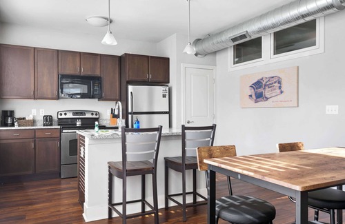 Mile Square Apartment | Downtown corner unit with free parking