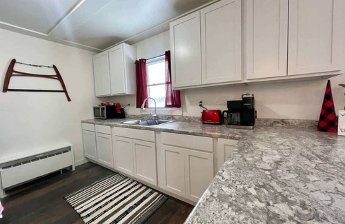 Ironwood Condo | Downtown "Red Room" at Villages on Aurora