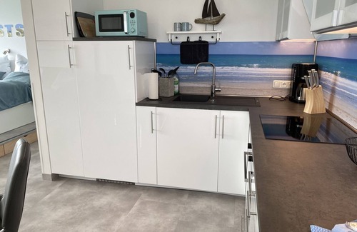 Sierksdorf Apartment | DTV * - look directly at the sea from your bed - one-room apartment, superbly furnished,