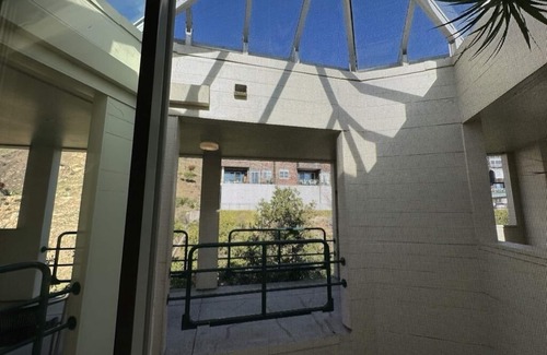 Point Richmond Condo | Easy access penthouse with dazzling nightlights & high ceilings.