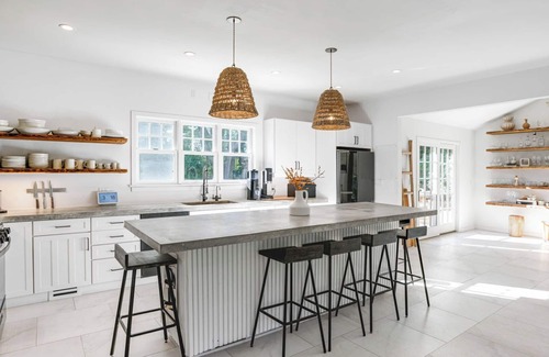 Montauk House | Eclectic-style home with private pool, fitness studio, open-floor plan,.