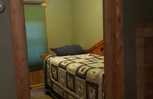 Alpena Cottage | Edge of Brothers Bay on Long Lake, Alpena, MI. Weekday 3 People base rate