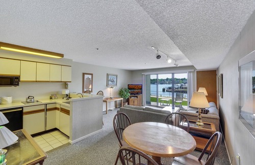 Charlevoix Condo | Edgewater #119 | Water Views + Private Balcony | Pool, Hot Tub, Sauna | Patio
