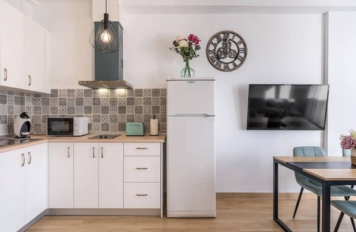 Pradollano Apartment | Edificio Los Alpes Apartment 'Frio Y Sol' with mountain views, private terrace, parking space, private parking space