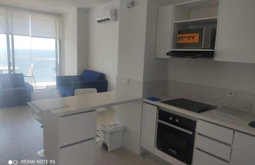 Papare Apartment | Edificio Sierra Beach Resort Pozos Colorados vista y salida al mar