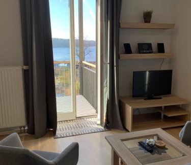 Rheinsberg Apartment | Einraumapartment mit Seeblickbalkon