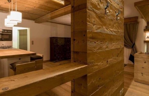 Sankt Moritz-Bad Ski Chalet | Elegant Golden Chalet in a Prime Location