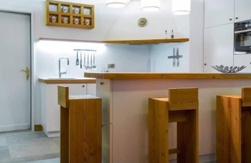 Sankt Moritz-Bad Ski Chalet | Elegant Golden Chalet in a Prime Location