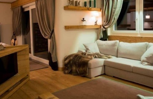 Sankt Moritz-Bad Ski Chalet | Elegant Golden Chalet in a Prime Location