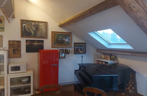 Carrobbio Apartment | Elegant loft with cathedral terrace and park view