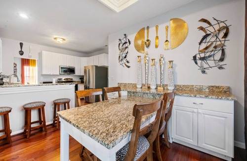 Varina House | Elegant Retreat: Spacious with Outdoor Fireplace