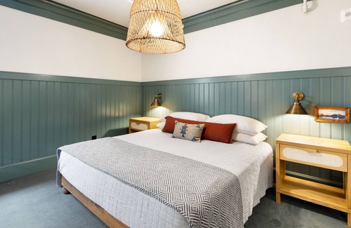 Poulsbo Apartment | Elegant room at Historic Hotel Scandi with sofabed, kitchenette, & city views