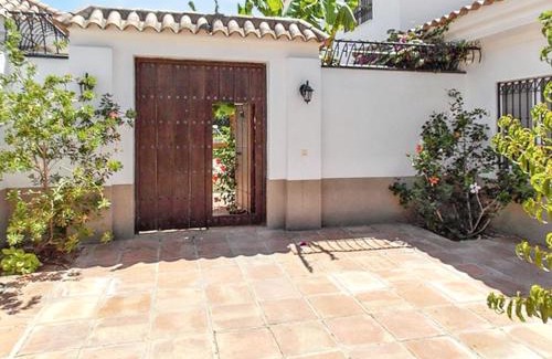 Nuevo Portil Villa | Elegant Villa in Nuevo Portil with Shared Pool