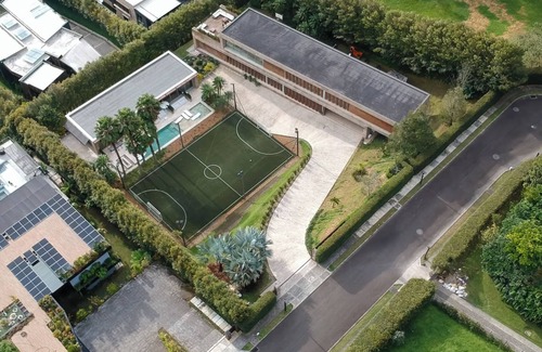 Envigado House | Elite 8BR Luxury Mansion Heated Pool Chef Maid Movie Theater Soccer Field Club