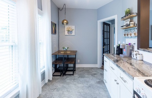 Oswego Apartment | Elysian Loft – Where Serenity Meets Style, Your Tranquil Retreat Above the Spa