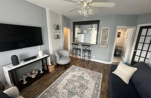 Oswego Apartment | Elysian Loft – Where Serenity Meets Style, Your Tranquil Retreat Above the Spa