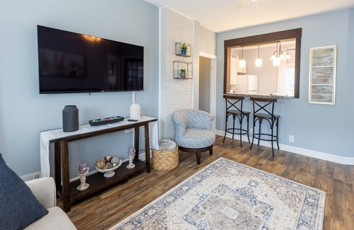 Oswego Apartment | Elysian Loft – Where Serenity Meets Style, Your Tranquil Retreat Above the Spa