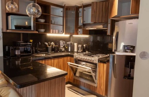 Colonia Cuauhtemoc Apartment | Embrace Today's Elegance: Capullo's Nowness Bathed in Roma Norte Sunlight.n