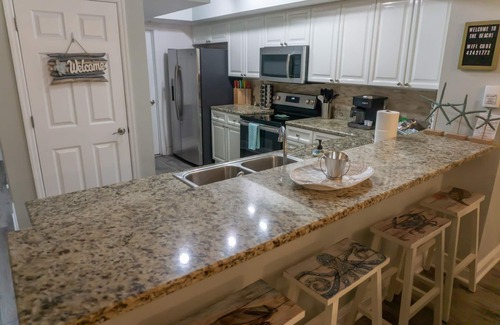 Panama City Beach Condo | Emerald Beach #330 Beach Chairs + balcony