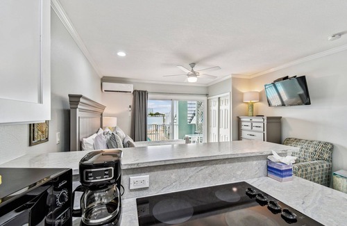 Bay Esplanade Apartment | Enchanted Inn Suite #2 w/View of the Intra-costal water-way Pool, Fishing Dock,
