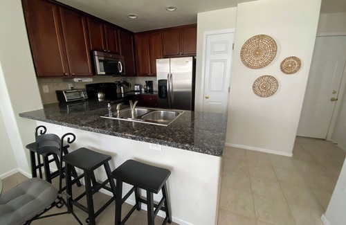 Aurora House | End-unit townhome with garage, patio, and office, near shopping and trails!